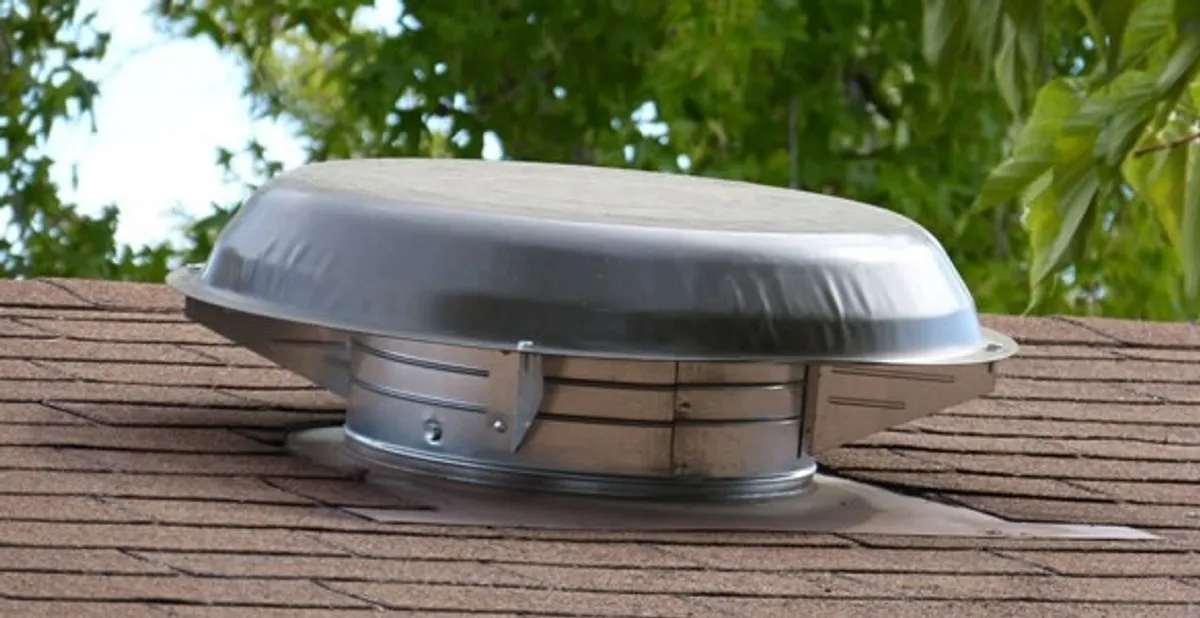 attic fan installation services with low-profile roof ventilation unit in Green Bay, WI