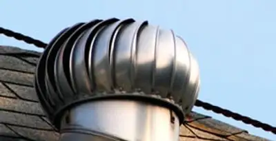 attic fan installation services with professionally installed roof ventilation unit in Green Bay, WI
