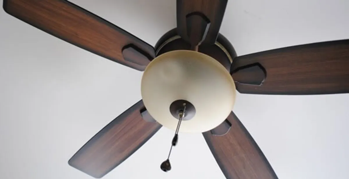 Fully installed ceiling fan with balanced blades and light fixture in Green Bay, WI