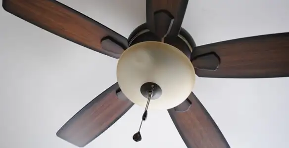 Fully installed ceiling fan with balanced blades and light fixture in Green Bay, WI