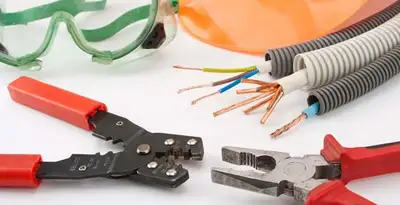 Electrical wiring repair with professional tools and safety equipment in De Pere, WI