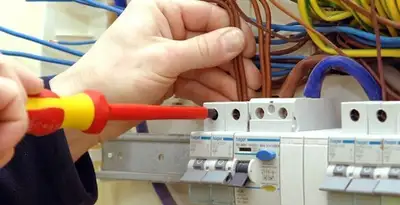 electrician services performing professional electrical panel wiring and connections in Green Bay, WI