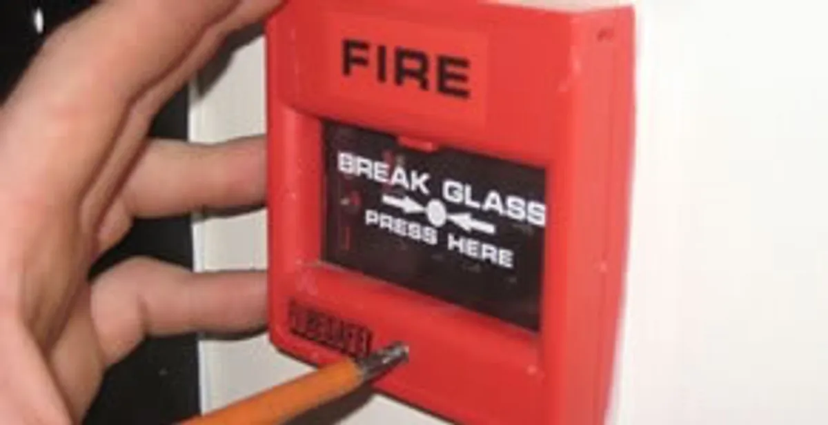 fire alarm installation service showing manual fire alarm pull station installed by licensed electricians in Green Bay, WI