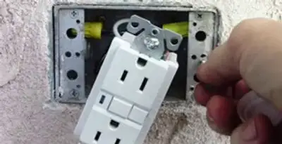 gfci circuits service showing installation of a ground fault circuit interrupter outlet by licensed electricians in Green Bay, WI