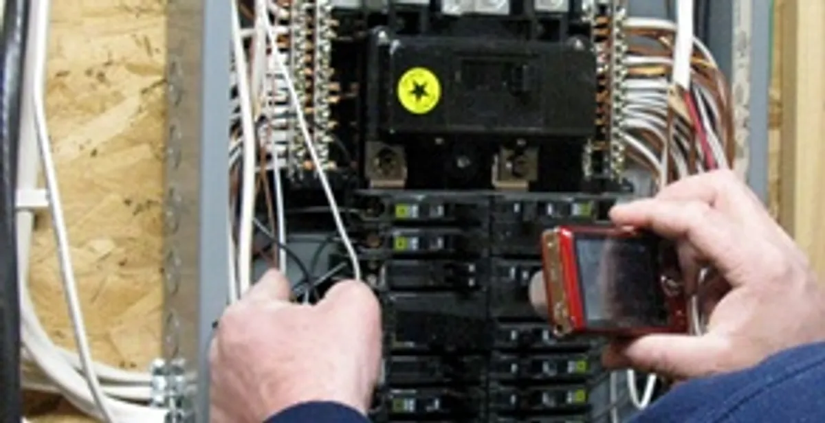 Home electrical inspection of circuit breaker panel by licensed electrician in Green Bay, WI