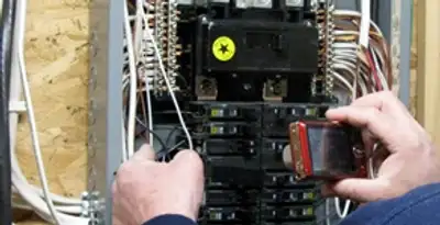 Home electrical inspection of circuit breaker panel by licensed electrician in Green Bay, WI