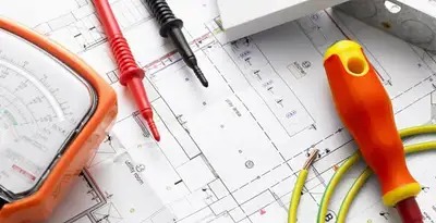 licensed electrician planning and testing electrical systems using professional tools in Green Bay, WI