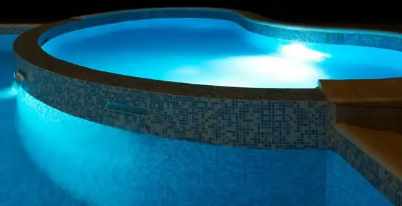 pool light installation and repair services highlighting illuminated pool interior lighting in Green Bay, WI