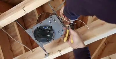 Professional recessed lighting installation with electrical wiring by licensed electricians in Green Bay, WI