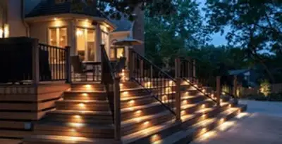 Residential electrician installing outdoor lighting for home safety in Green Bay, WI