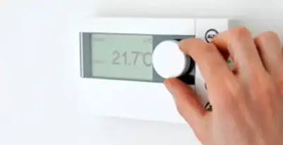 Thermostat installation service with professional adjusting temperature control in Green Bay, WI