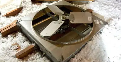 whole house fan installation services with attic-mounted ventilation unit in Green Bay, WI