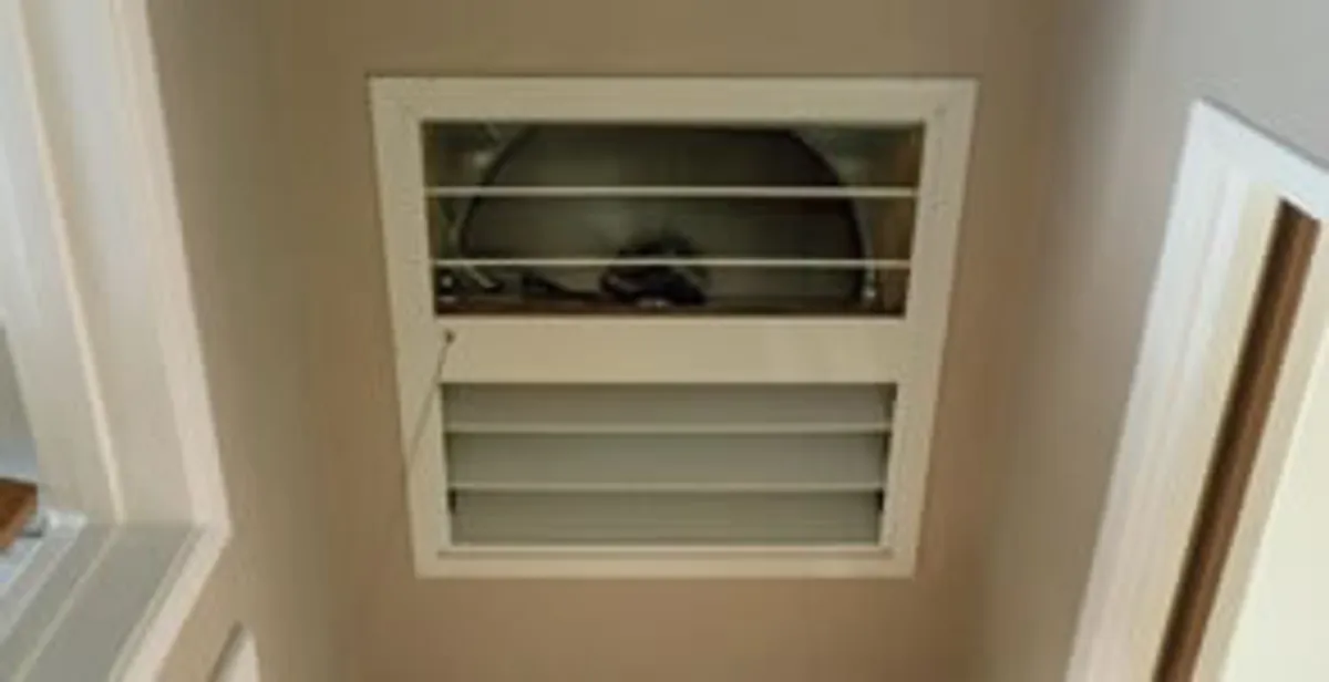 whole house fan installation services with ceiling-mounted ventilation system in Green Bay, WI
